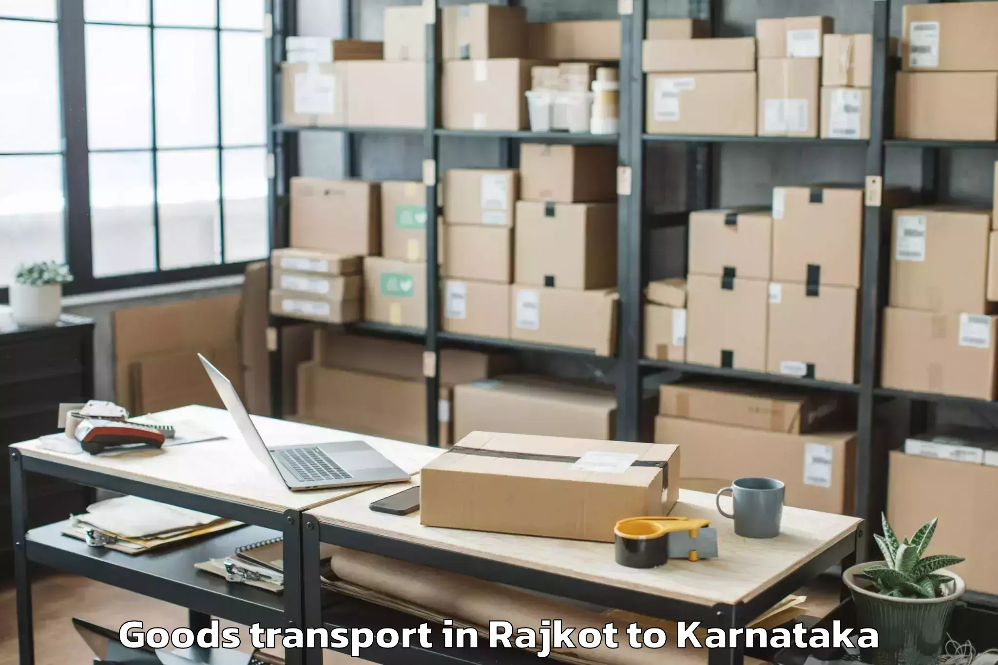 Top Rajkot to Karnataka Janapada Vishwavidya Goods Transport Available